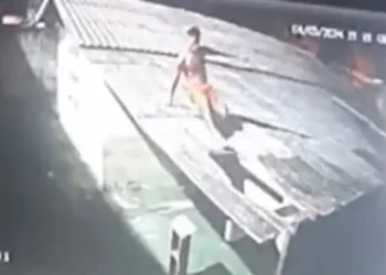 detento flagrado pegando pacote