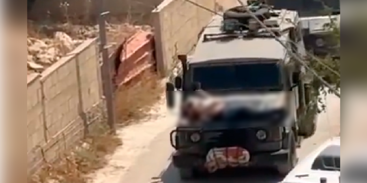 Palestino-e-amarrado-em-carro-do-Exercito-de-Israel