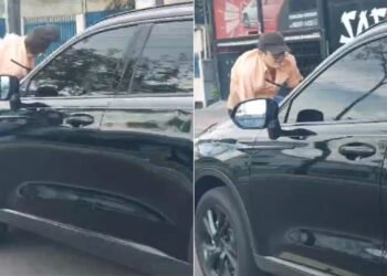 Idoso é levado em cima do capô de carro