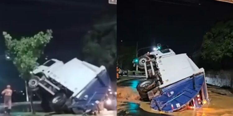 Caminhão cai em cratera após rompimento de adutora