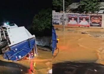 Caminhão de lixo cai em cratera na avenida Coronel Teixeira