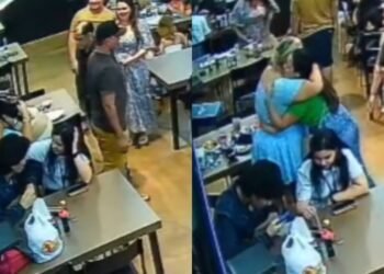 Mulher é surpreendida com parabéns de funcionários e clientes