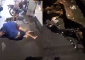 Motociclista e passageira ficam feridos após queda em cratera