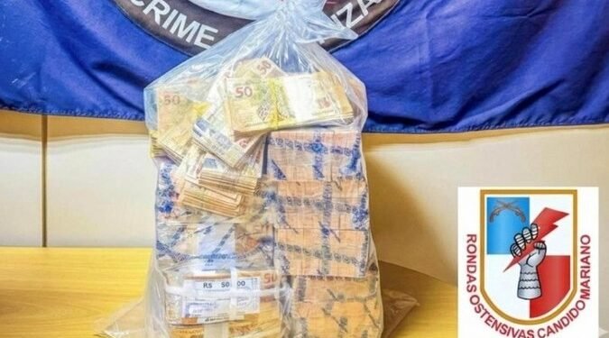 homem-preso-dinheiro