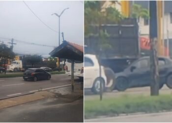 Carro fica embaixo de carreta parada e causa susto na Avenida Max Teixeira